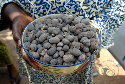 Woman holding bowl pure shea butter Pure Coco